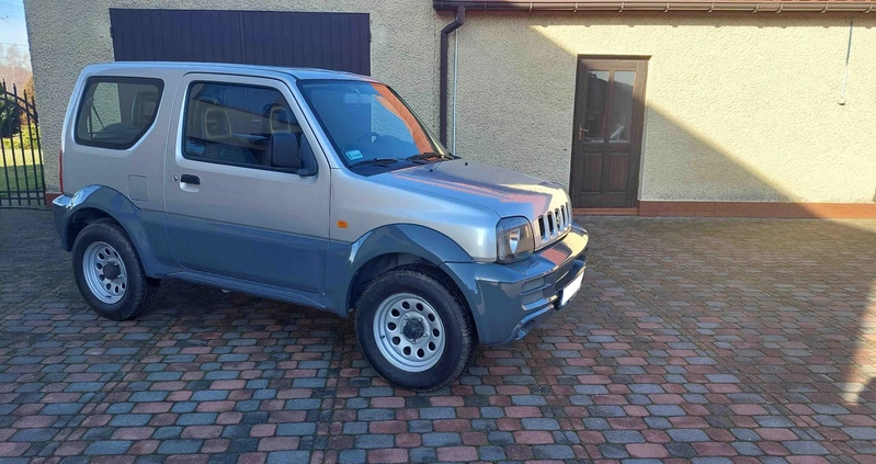 Suzuki Jimny cena 35700 przebieg: 155460, rok produkcji 2011 z Nidzica małe 211